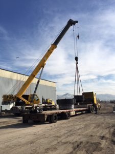 Crane loading Step Deck